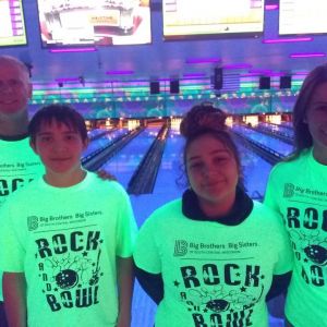 Two Bigs and two Littles pose at Bowl For Kids Sake event